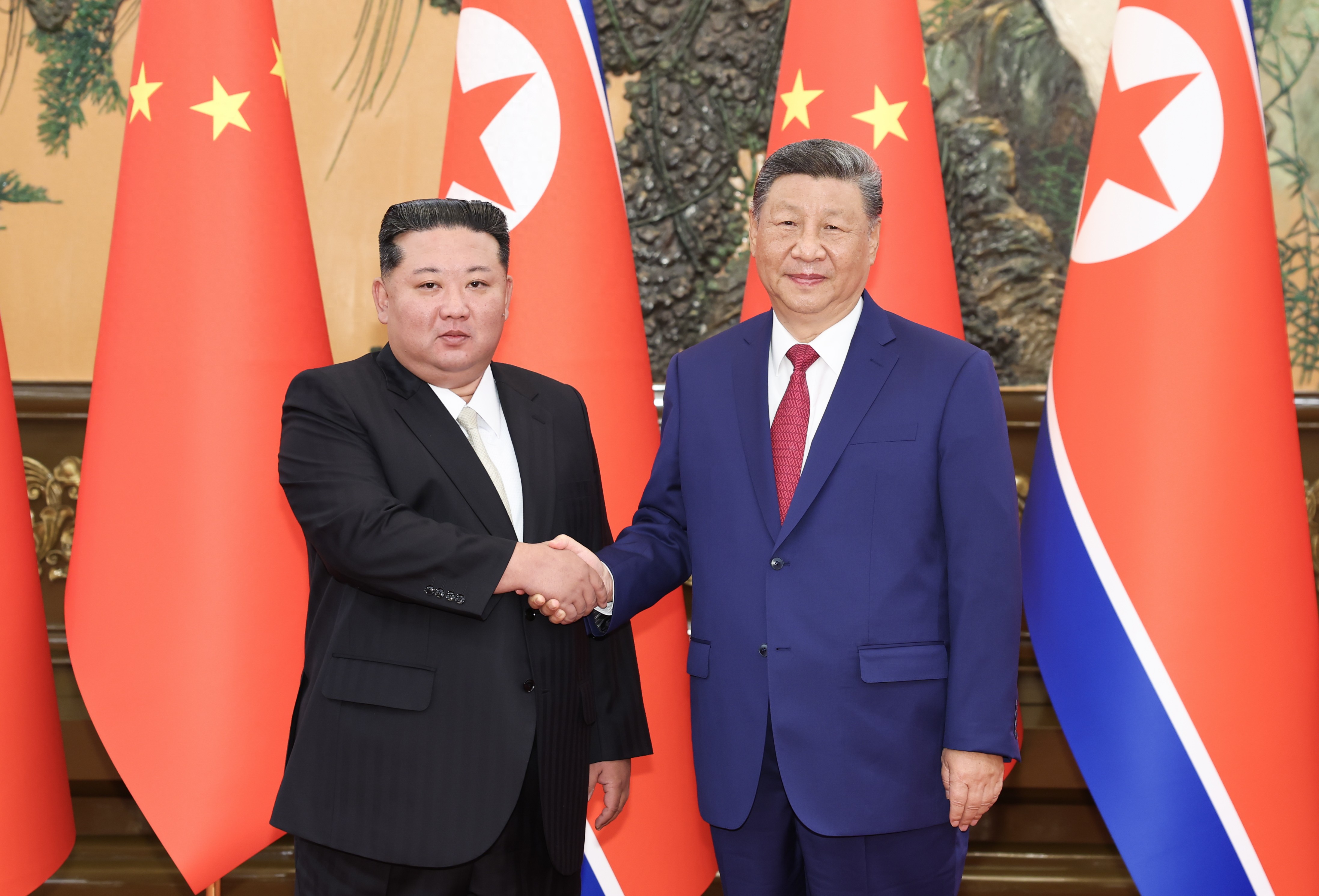 習近平同朝鮮勞動黨總書記、國務委員長金正恩舉行會談 